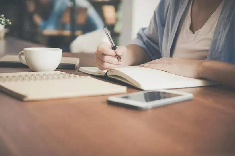 A man writing a blog